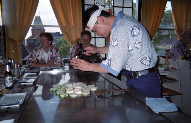 The cook is working carefully