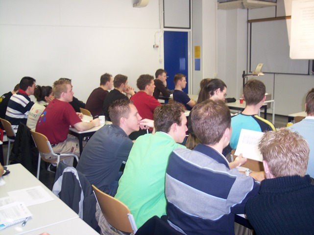 The participants listen carefully